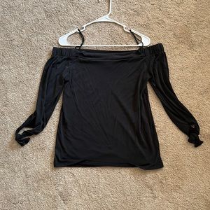 Black off shoulder top with spaghetti straps (can be tucked in)
